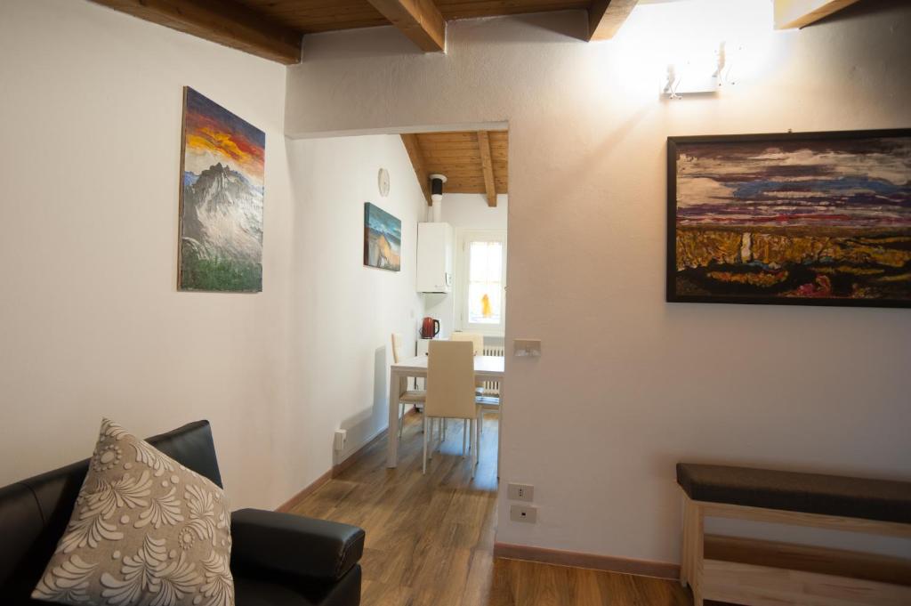 a living room with a couch and a table at Il Borgo appartamento Luca in Parma