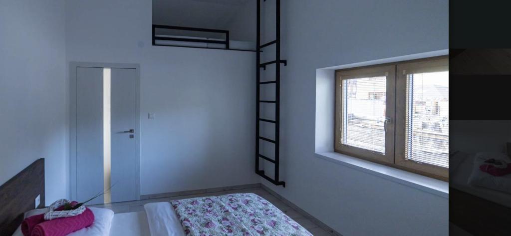 Postel nebo postele na pokoji v ubytování Penzion Tera u zámku Červená Lhota