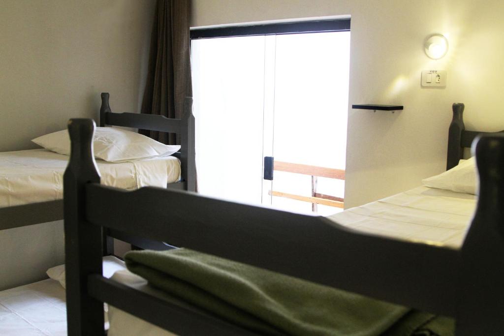 Llit o llits en una habitació de Soul Hostel Av Paulista Bela Vista 1