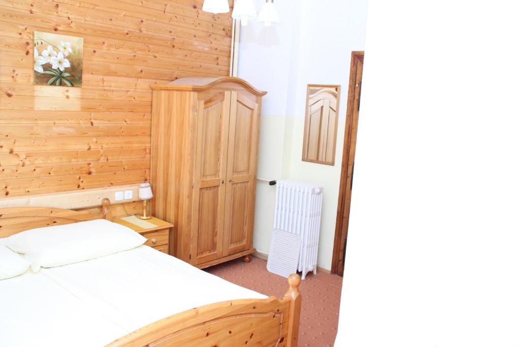 Postel nebo postele na pokoji v ubytování Gasthof Edelweiss