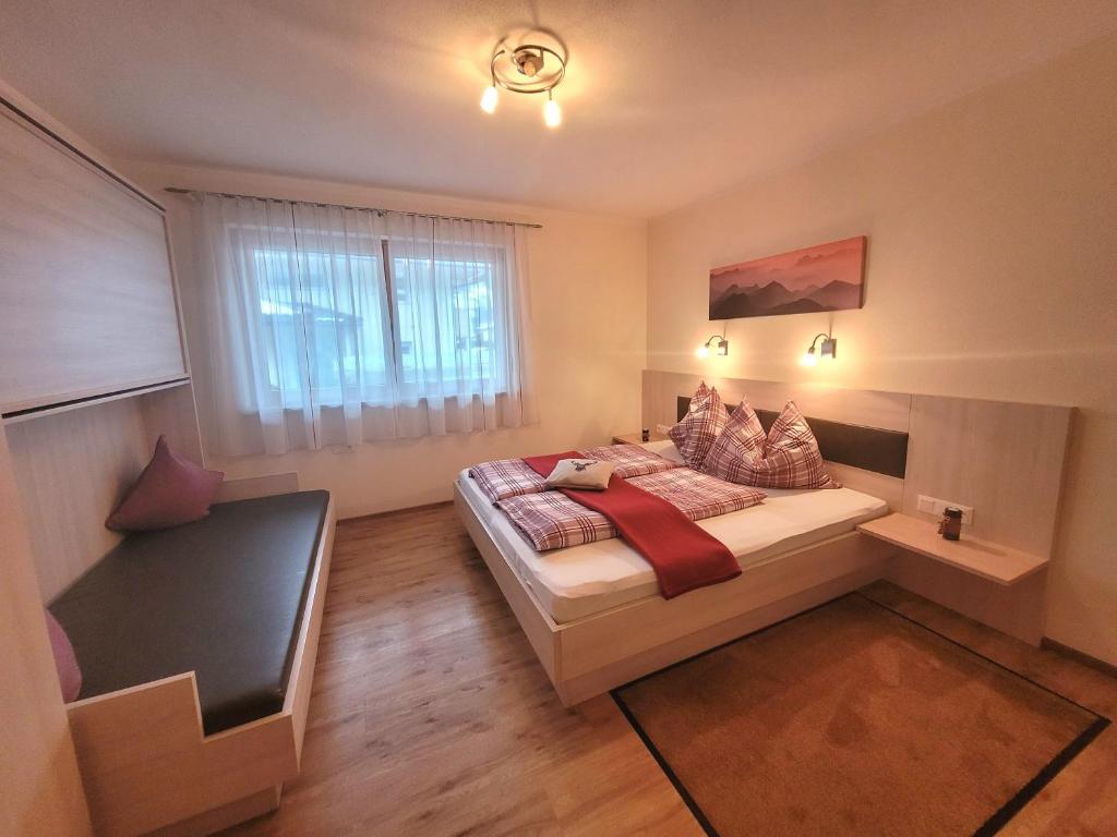 Posteľ alebo postele v izbe v ubytovaní Apart Zillertal