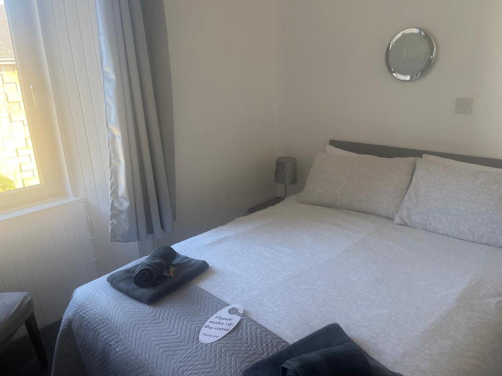 Postel nebo postele na pokoji v ubytování Dunarle Guesthouse