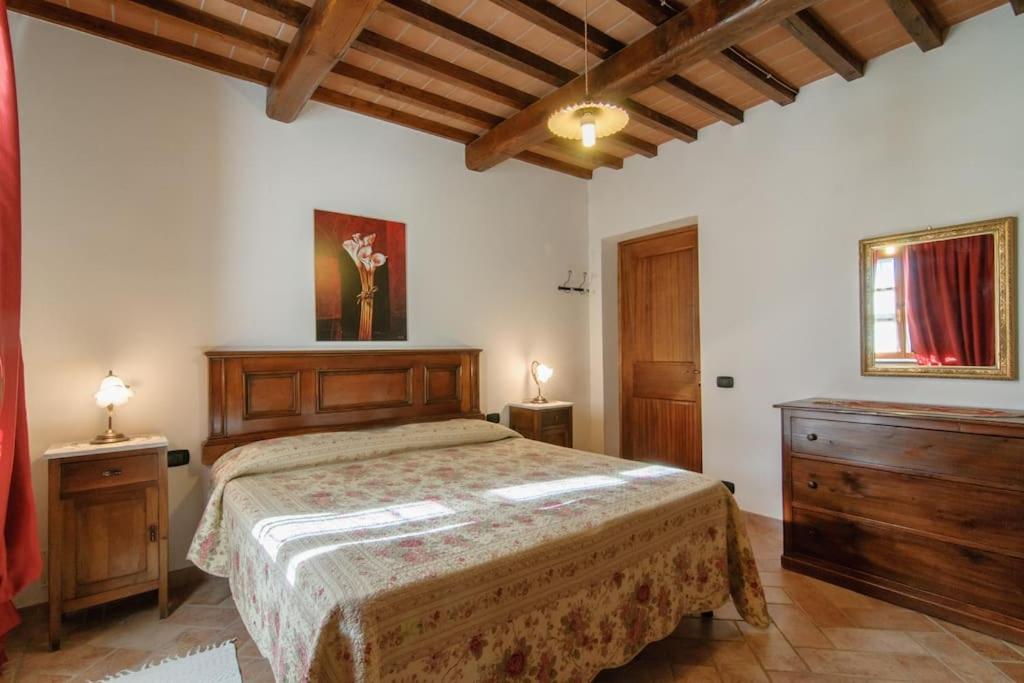 Postel nebo postele na pokoji v ubytování Villa Perugini