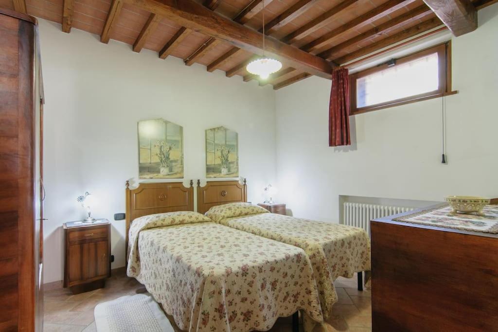 Postel nebo postele na pokoji v ubytování Villa Perugini