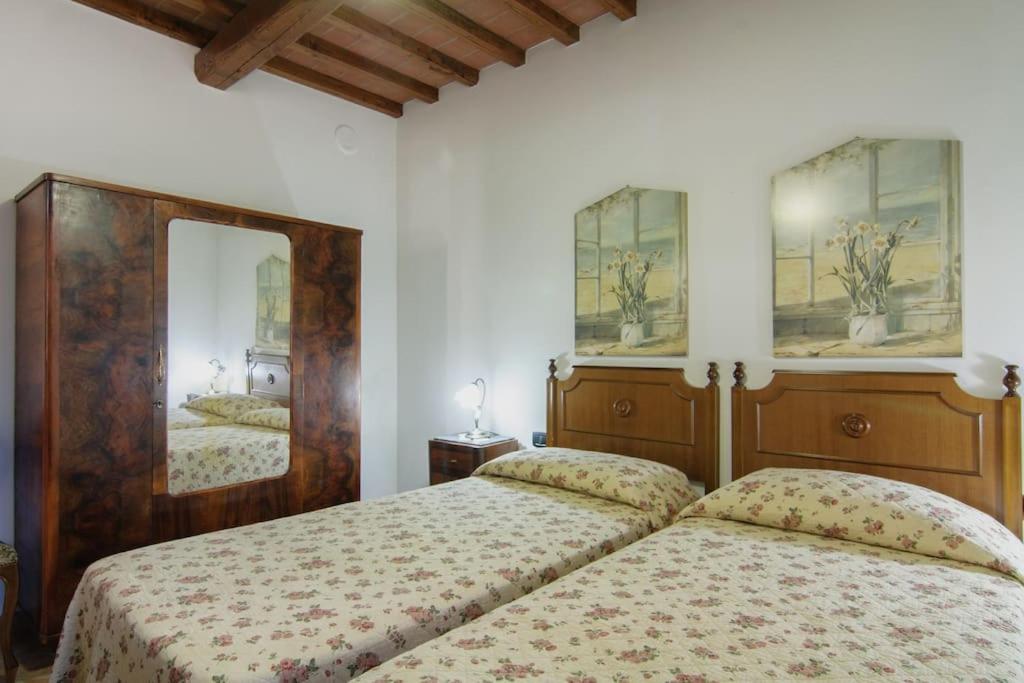 Postel nebo postele na pokoji v ubytování Villa Perugini