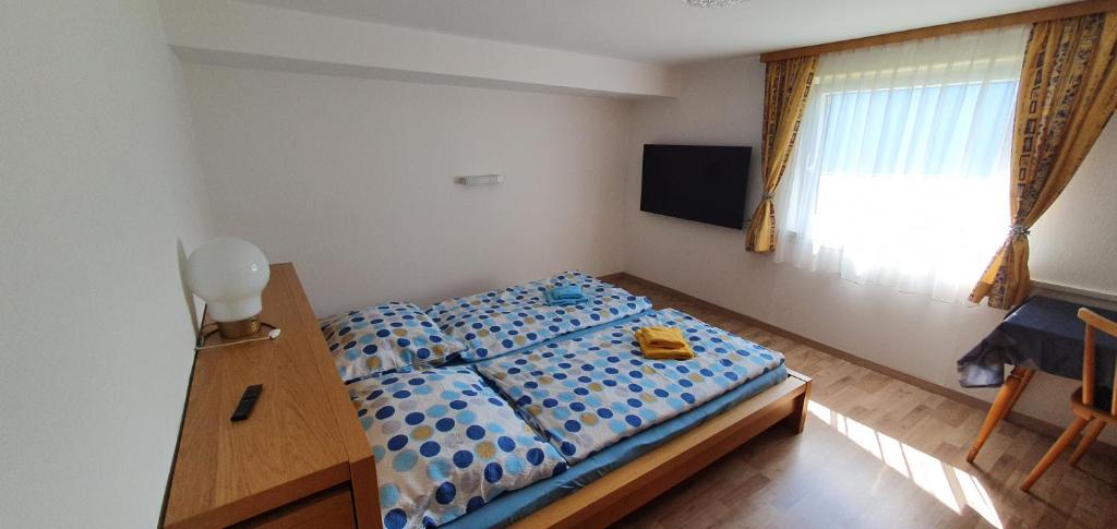 Postel nebo postele na pokoji v ubytování Stoffenhof