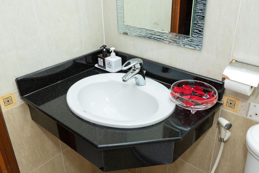 Phòng tắm tại Queen Garden Hotel & Apartment