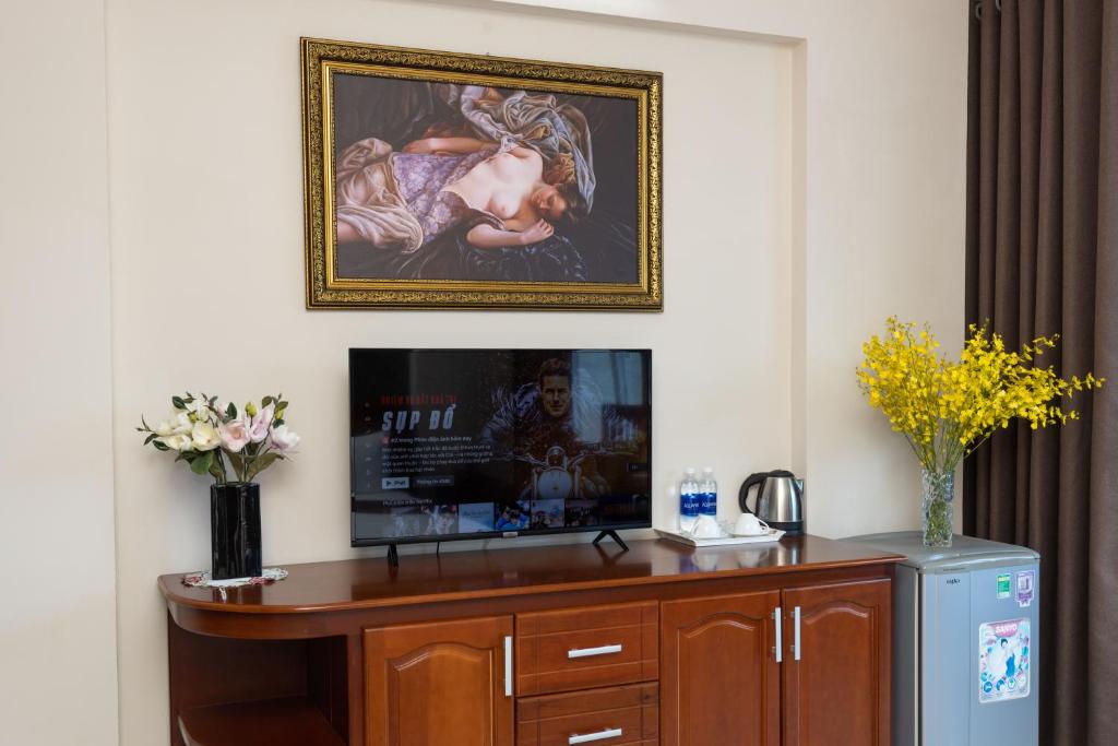 TV/trung tâm giải trí tại Queen Garden Hotel &amp; Apartment