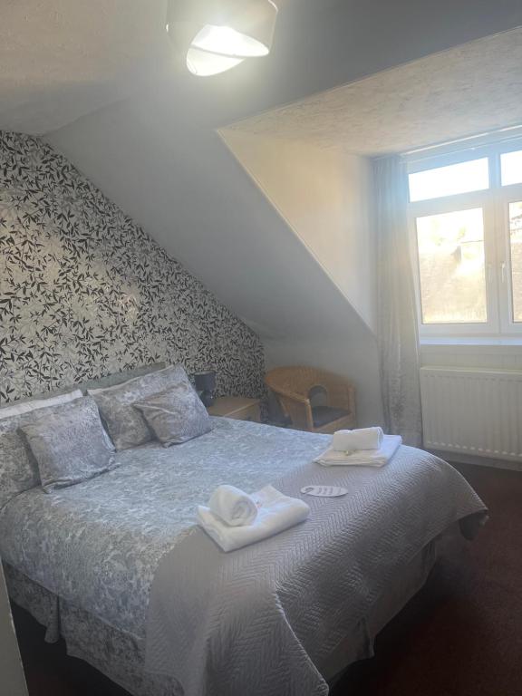 Letto o letti in una camera di DunMoore Guesthouse