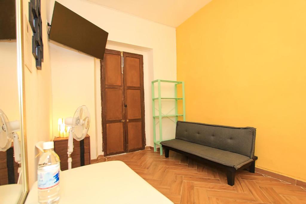TV a/nebo společenská místnost v ubytování Hotel Universidad