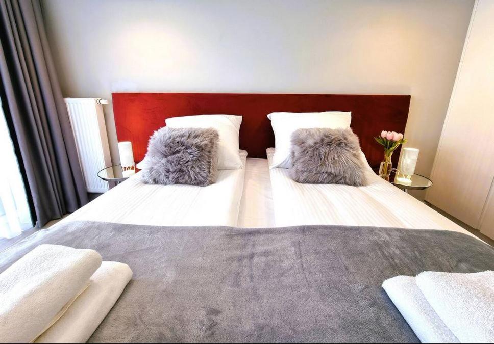 Posteľ alebo postele v izbe v ubytovaní Westin House Resort Kołobrzeg - 109 BASEN, SAUNA, JACUZZI, PRYWATNY PARKING W CENIE