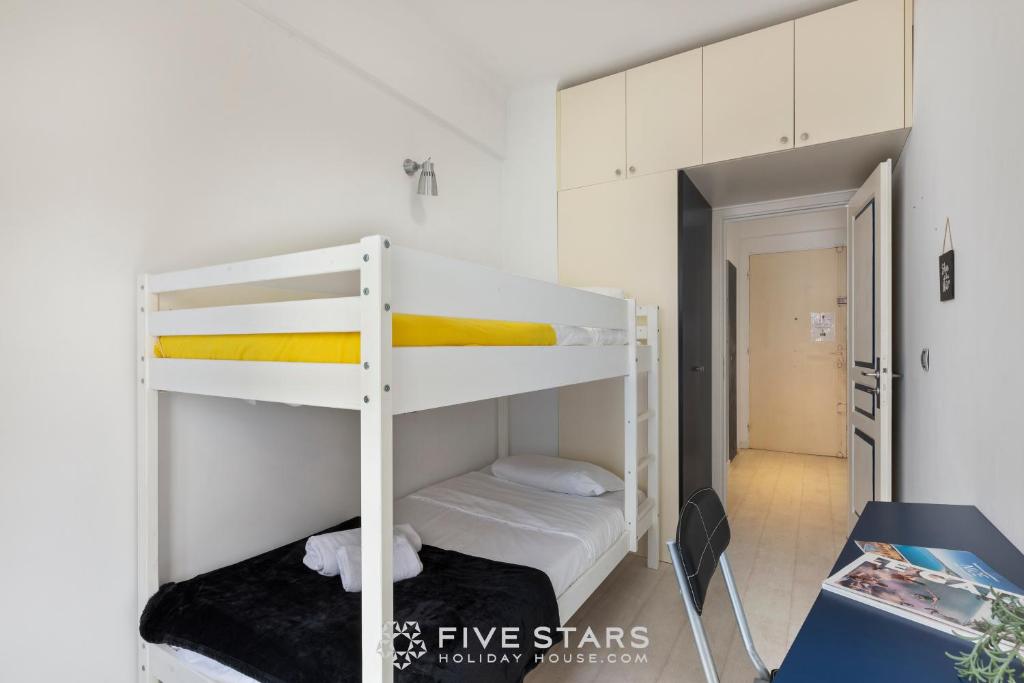 Кровать или кровати в номере Suite Reine Marie FSHH
