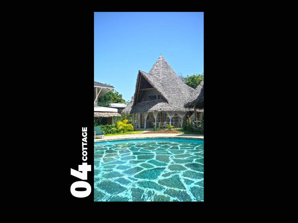 Bazén v ubytování 04 beach cottage malindi nebo v jeho okolí