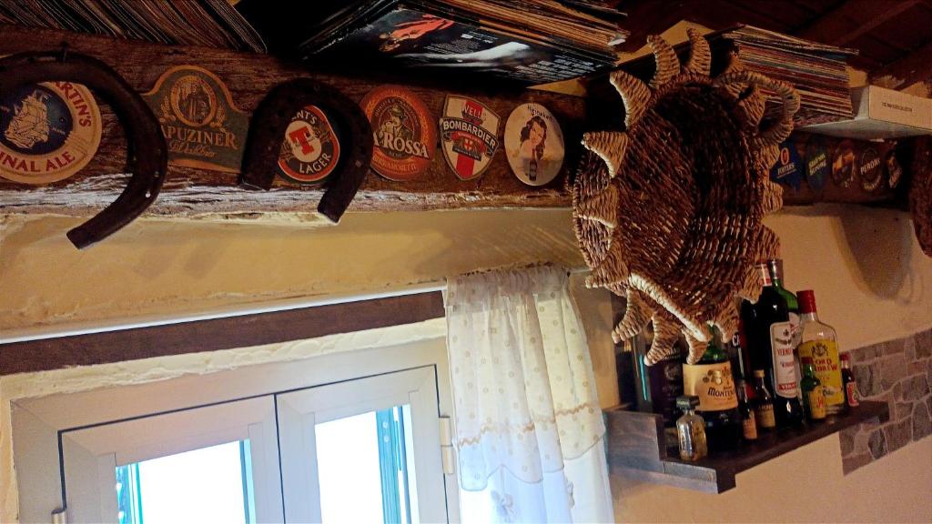 Nápoje v ubytovaní Accogliente casa in pietra in borgo medievale