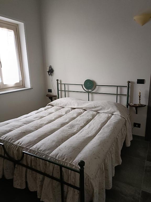 Posteľ alebo postele v izbe v ubytovaní Rosatea B&B