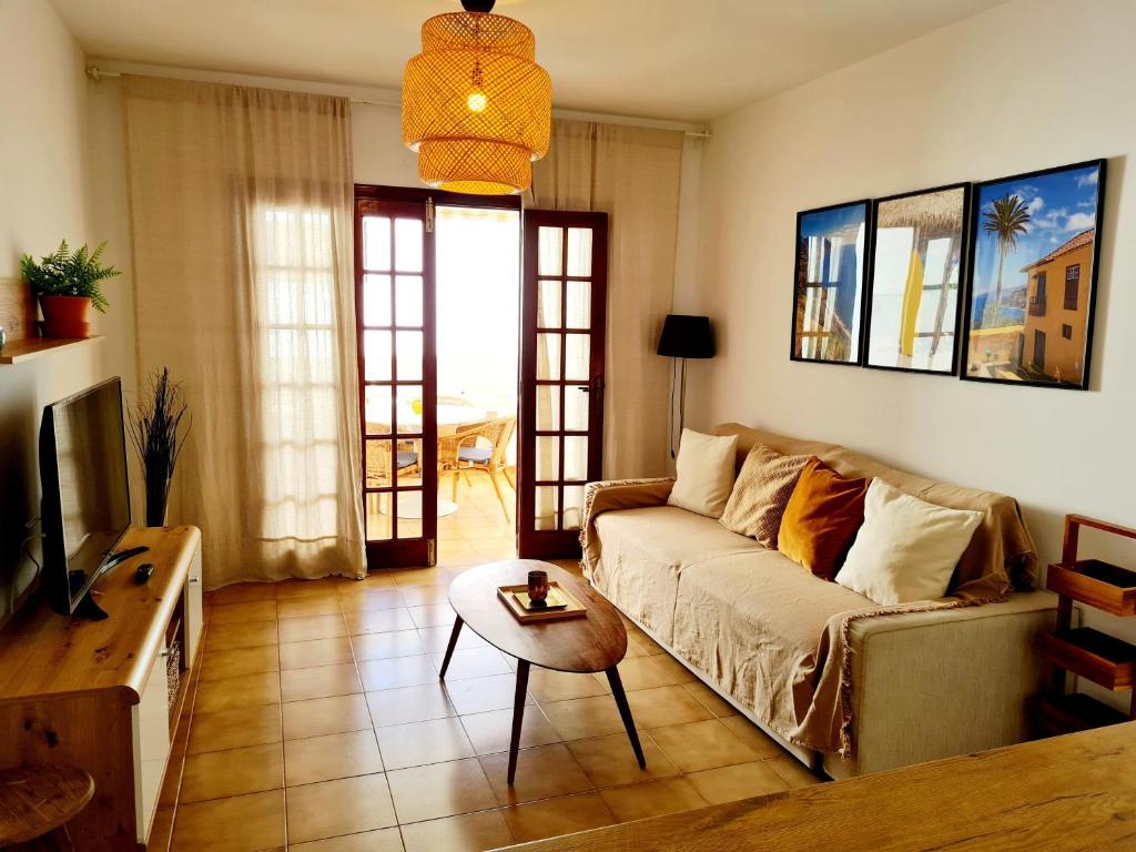 Et tv og/eller underholdning på Cozy Montanita Apartment