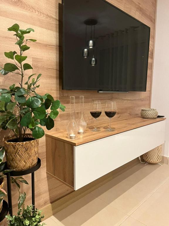 TV a/nebo společenská místnost v ubytování Oasis Roma