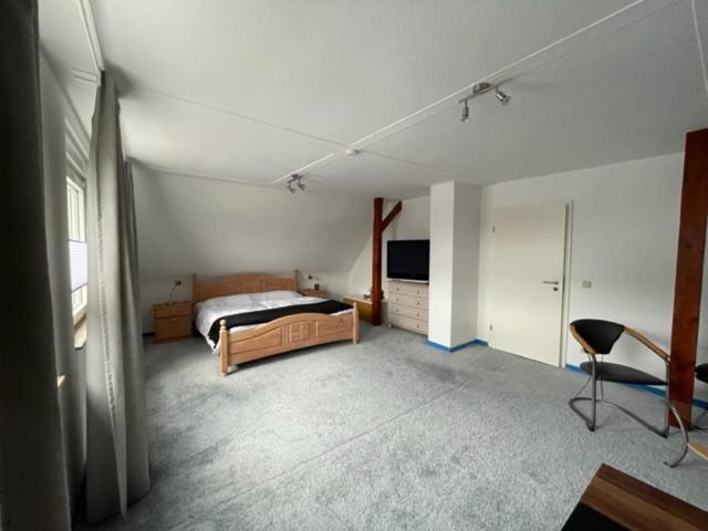 En eller flere senge i et værelse på Apartment Düte