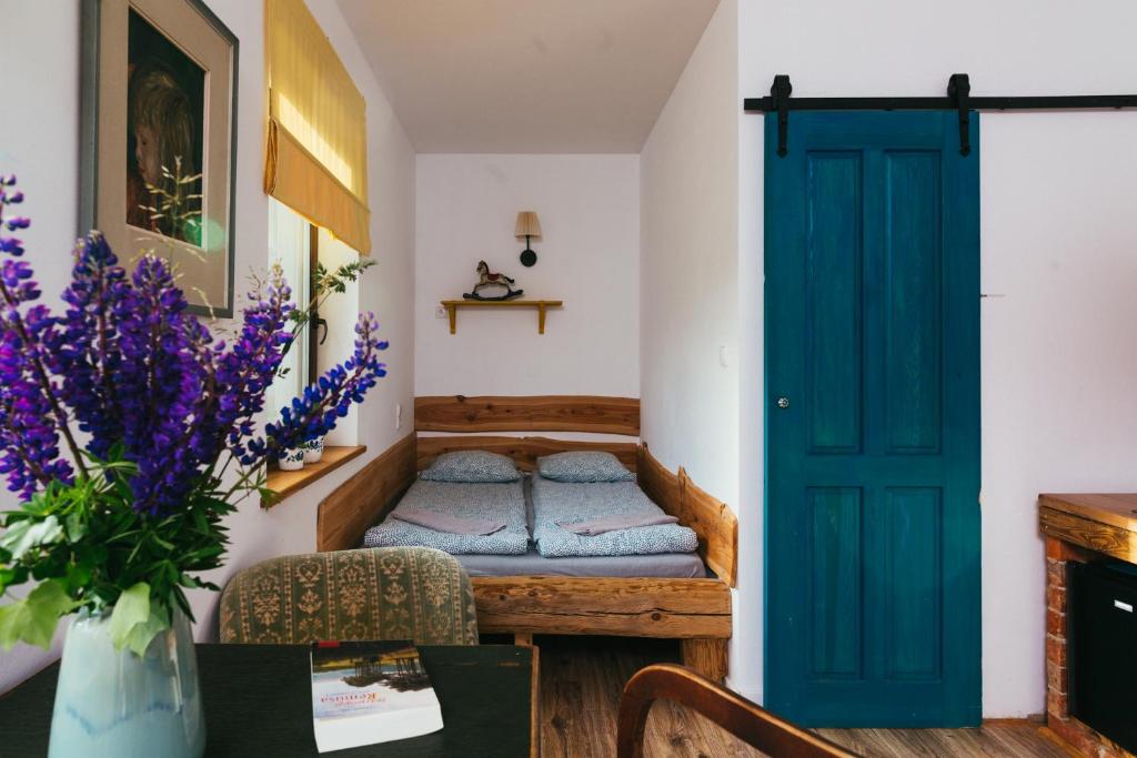 Posteľ alebo postele v izbe v ubytovaní Apartamenty na Pastwisku