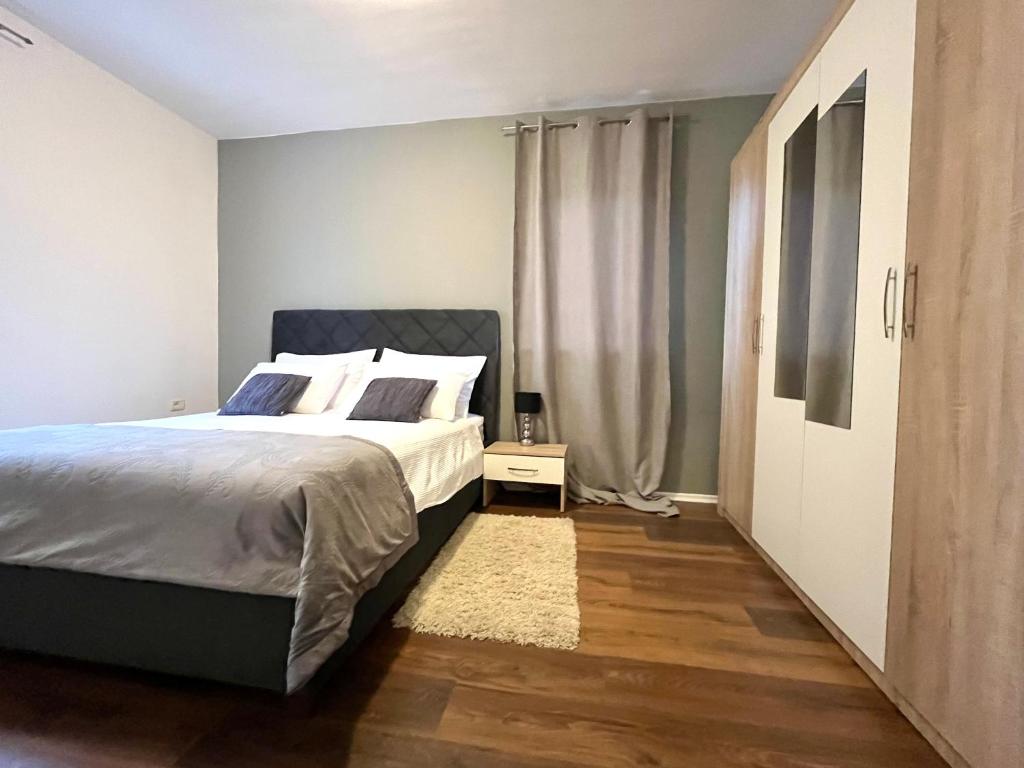 Tempat tidur dalam kamar di Apartment Domus Lauri