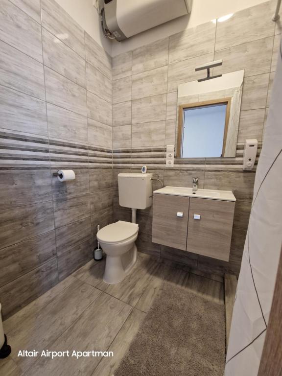 Koupelna v ubytování Altair Airport Apartman