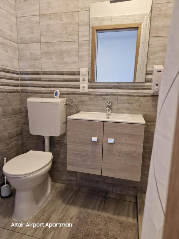 Koupelna v ubytování Altair Airport Apartman