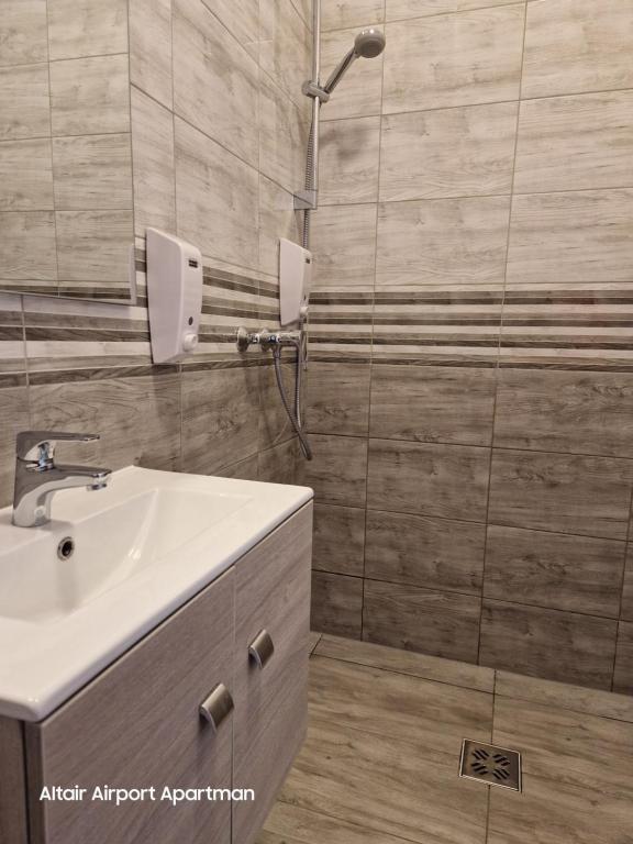 Koupelna v ubytování Altair Airport Apartman
