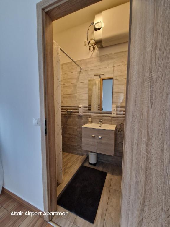 Koupelna v ubytování Altair Airport Apartman