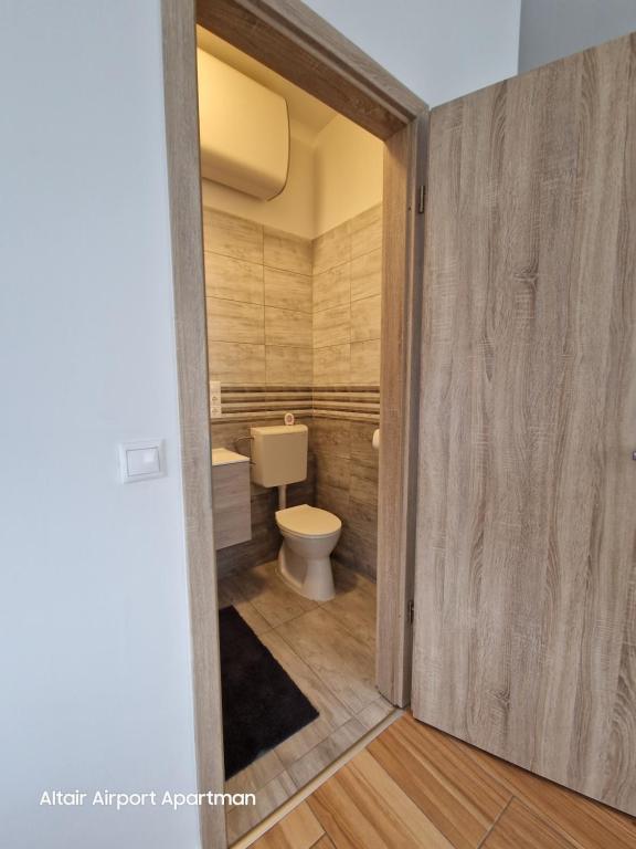 Koupelna v ubytování Altair Airport Apartman