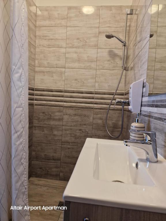 Koupelna v ubytování Altair Airport Apartman