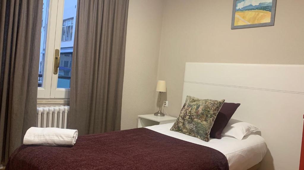 Posteľ alebo postele v izbe v ubytovaní Somnio Hostels
