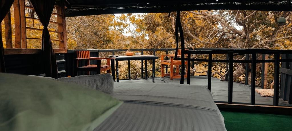 Balkón nebo terasa v ubytování Jungle Cabin - Bundala