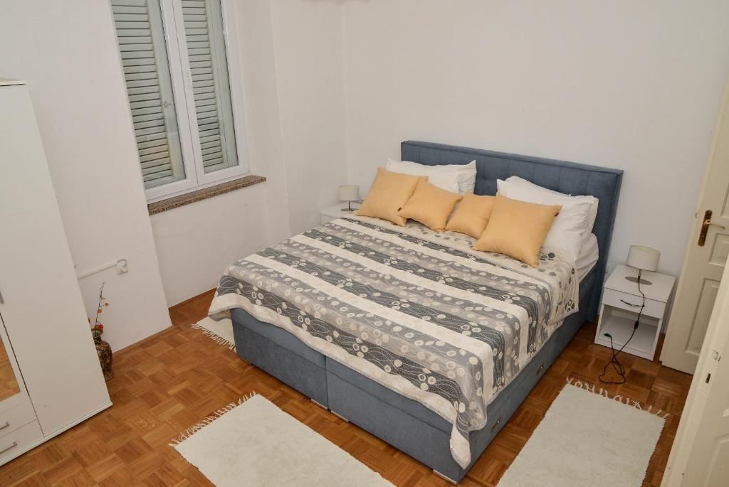 Posteľ alebo postele v izbe v ubytovaní Apartment Škunca