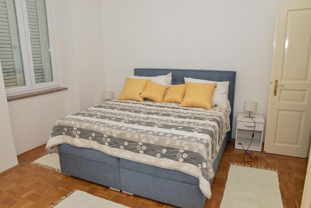 Posteľ alebo postele v izbe v ubytovaní Apartment Škunca