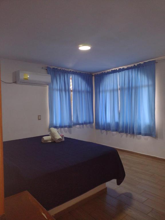 Postel nebo postele na pokoji v ubytování Hotel El Rincon de Don Juan
