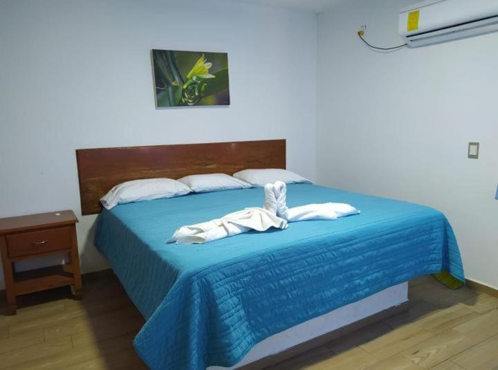 Postel nebo postele na pokoji v ubytování Hotel El Rincon de Don Juan
