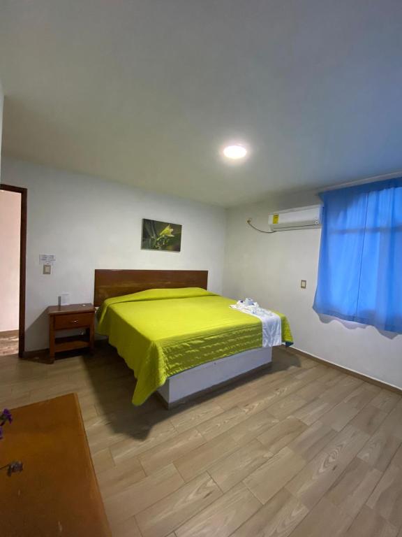 Postel nebo postele na pokoji v ubytování Hotel El Rincon de Don Juan