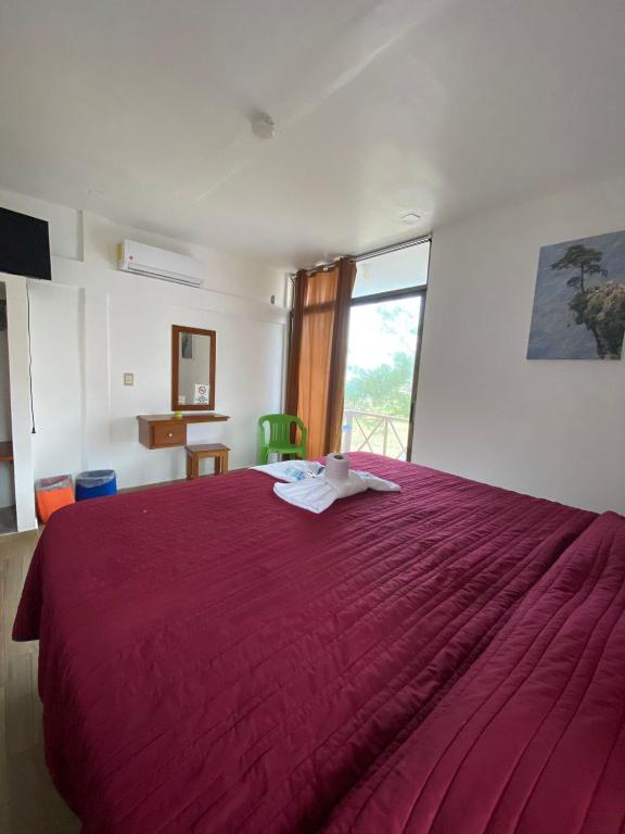 Postel nebo postele na pokoji v ubytování Hotel El Rincon de Don Juan