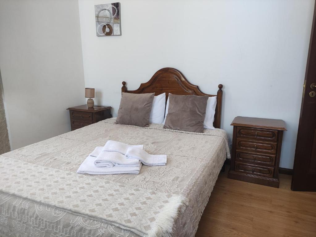 Postel nebo postele na pokoji v ubytování casa cardeal saraiva