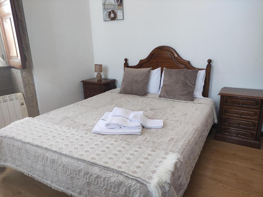 Postel nebo postele na pokoji v ubytování casa cardeal saraiva