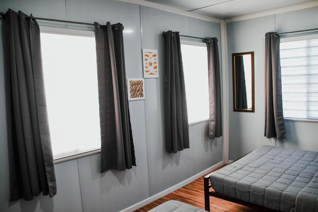 Postel nebo postele na pokoji v ubytování Olive Hostel Roxas City