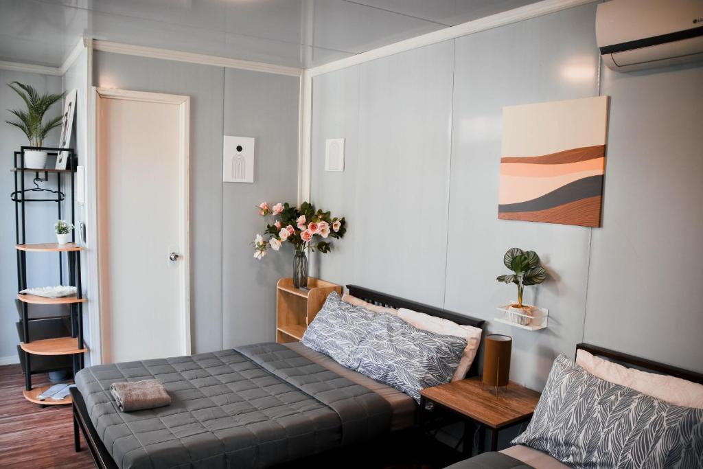 Postel nebo postele na pokoji v ubytování Olive Hostel Roxas City