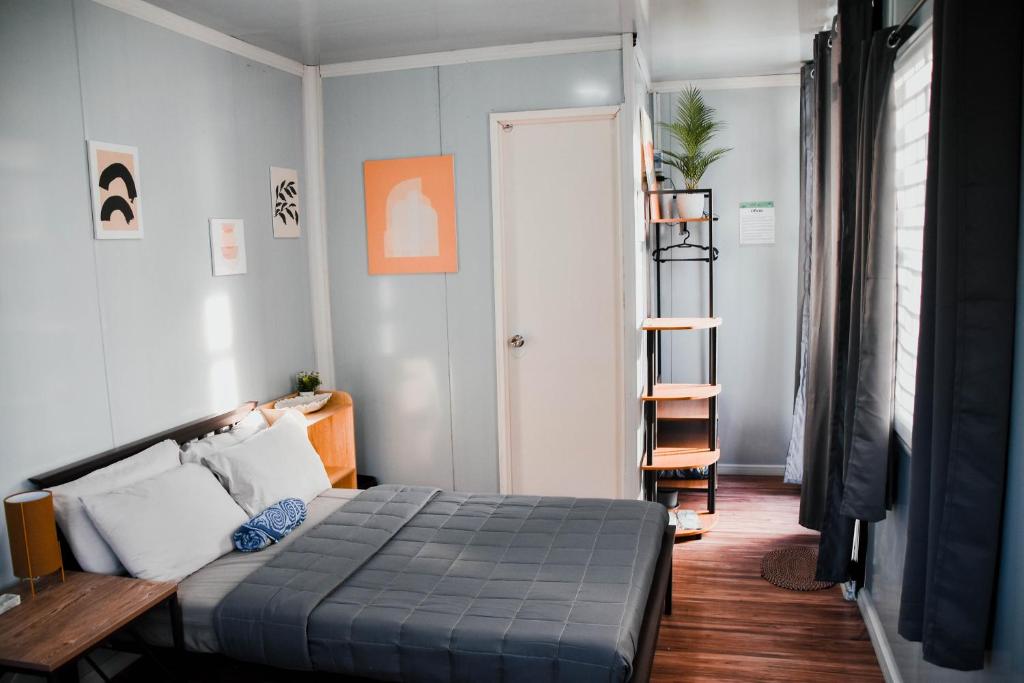 Postel nebo postele na pokoji v ubytování Olive Hostel Roxas City