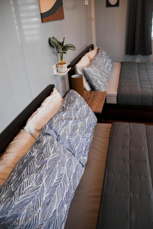 Postel nebo postele na pokoji v ubytování Olive Hostel Roxas City