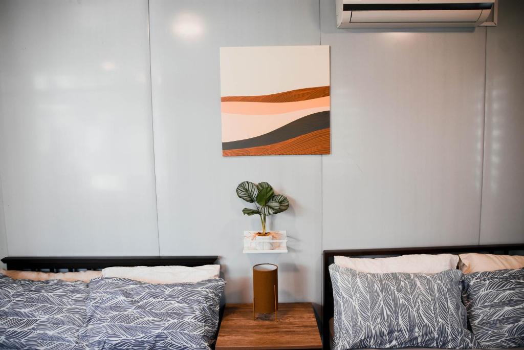 Postel nebo postele na pokoji v ubytování Olive Hostel Roxas City