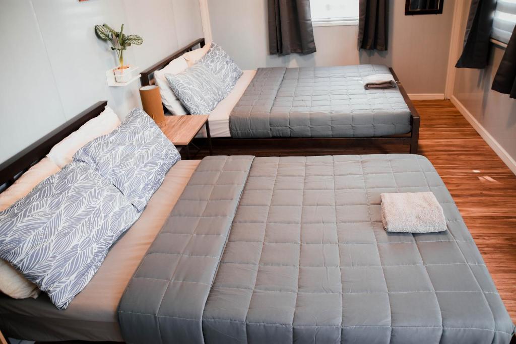 Postel nebo postele na pokoji v ubytování Olive Hostel Roxas City