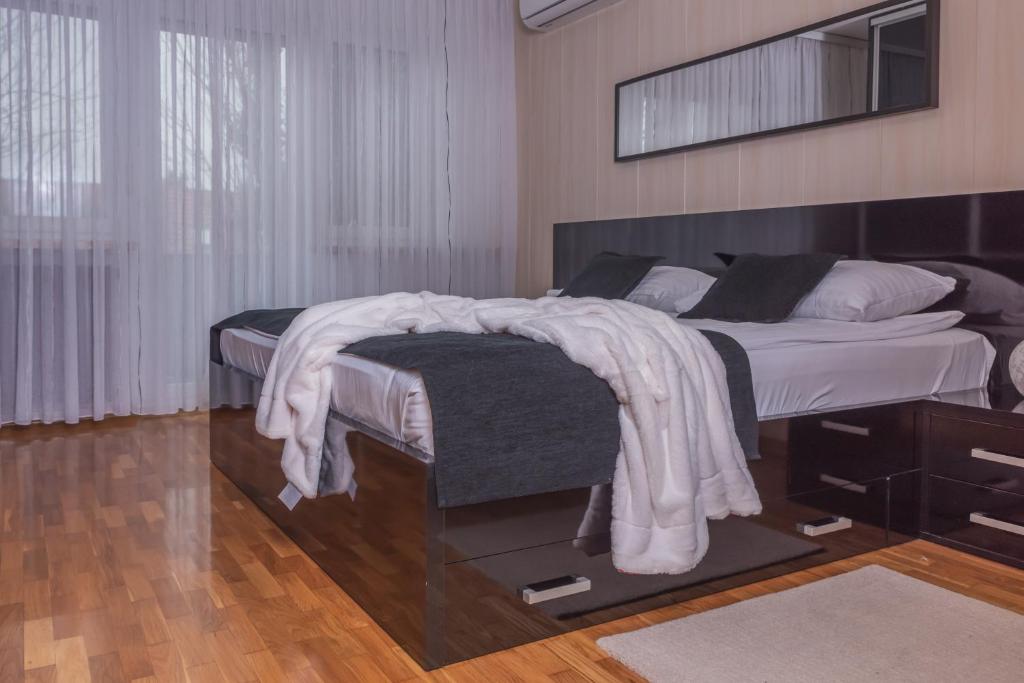 Postel nebo postele na pokoji v ubytování Apartment Check In Zagreb Maksimir-free parking