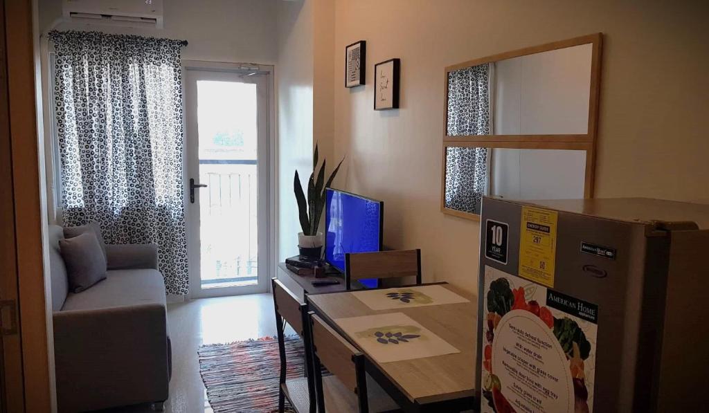 Χώρος καθιστικού στο Maki House Condo