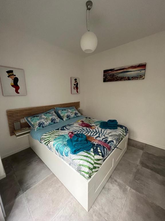 a bedroom with a bed in a room at Lucullo's Rooftop in Naples