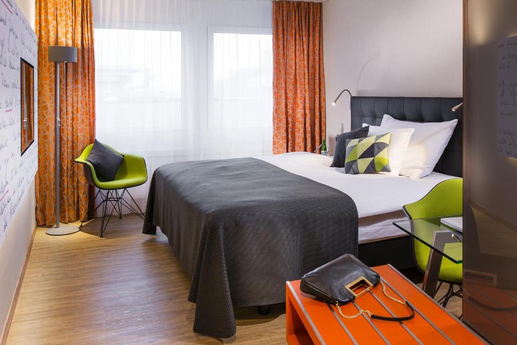 Postel nebo postele na pokoji v ubytování Hotel Arte